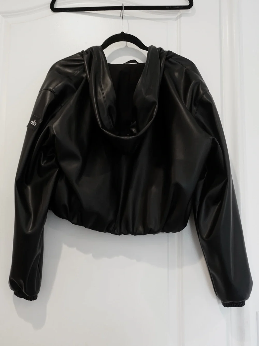 ALO Yoga Faux Leather Cropped Jacket in Black
